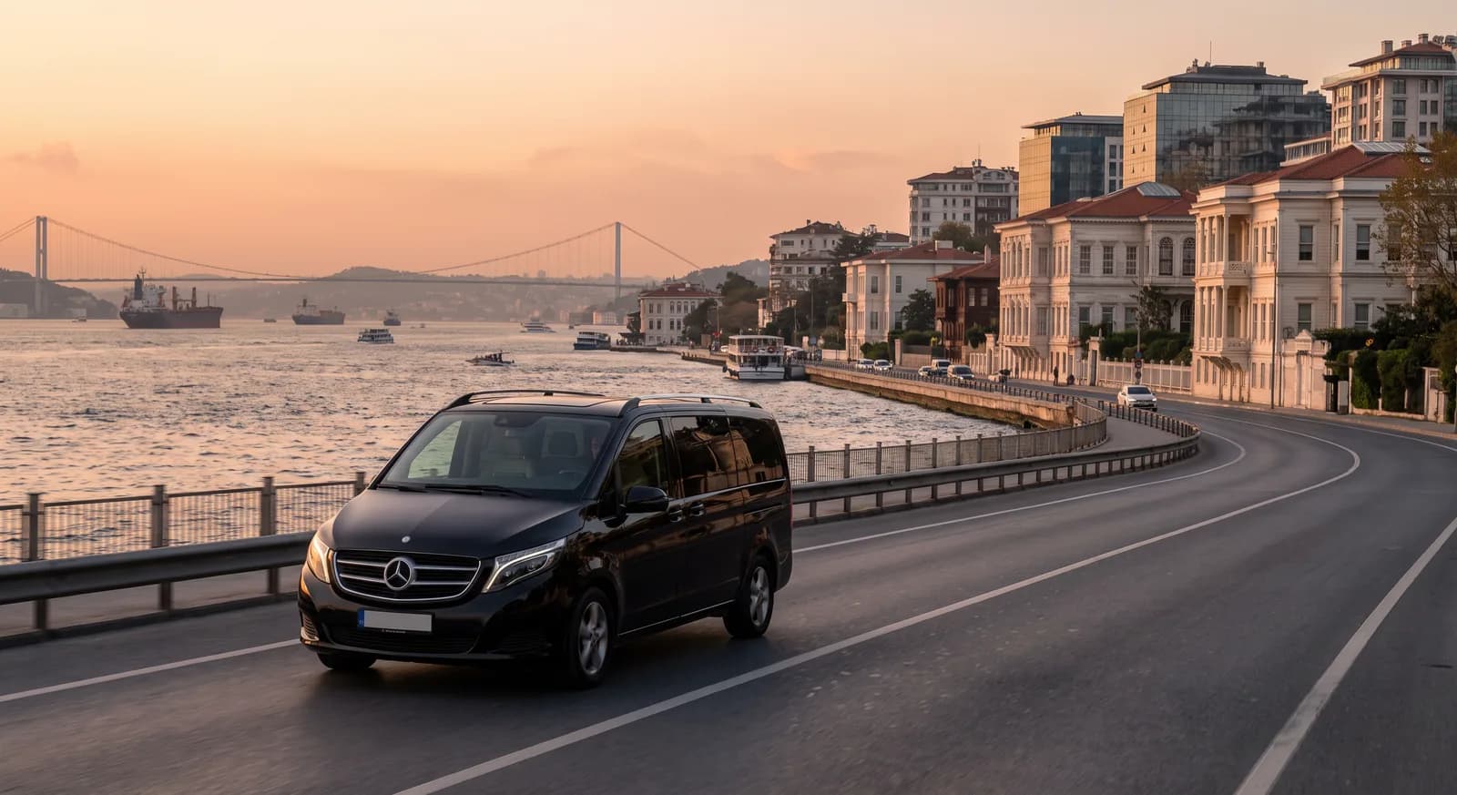 A vehicle on the Bosphorus waterfront road with the bridge in view